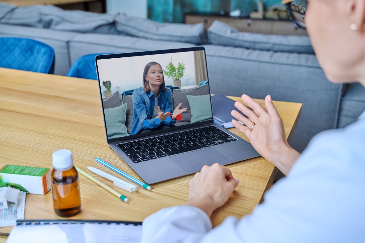 therapist and client participating in virtual therapy